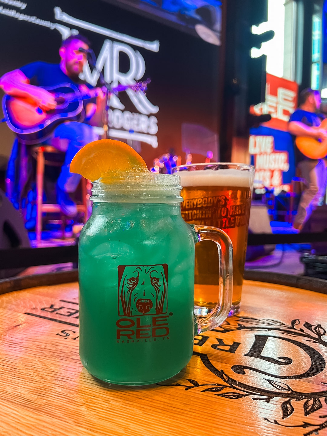 A green mocktail and a beer